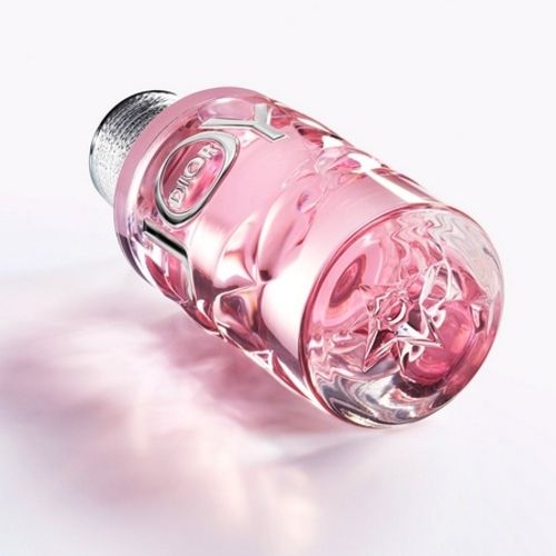 Bottle of Joy de Dior Intense coated