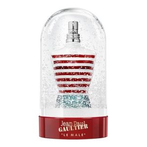 Jean Paul Gaultiuer signs a snow globe for his Le Male perfume
